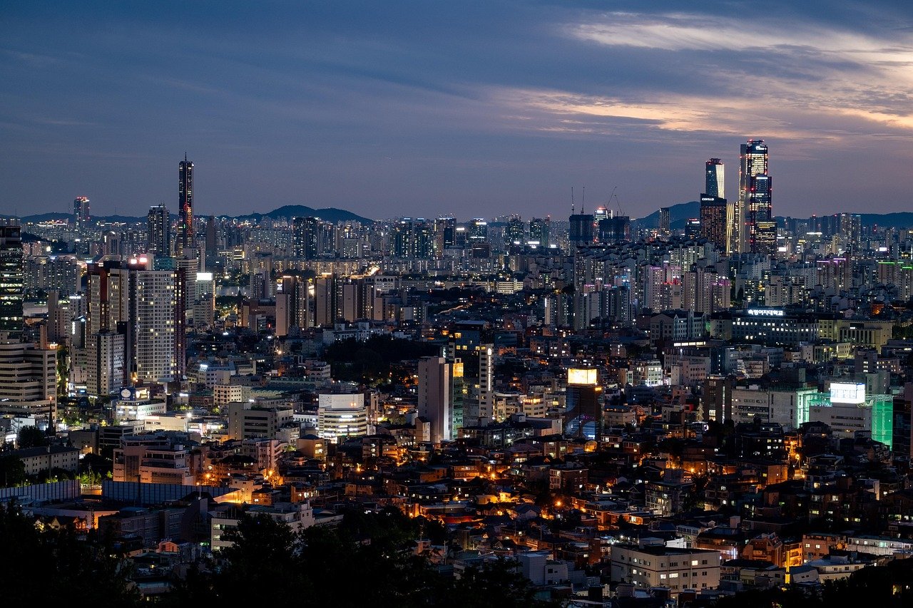 Seoul's city skyline lit up at night, seen from an elevated viewpoint