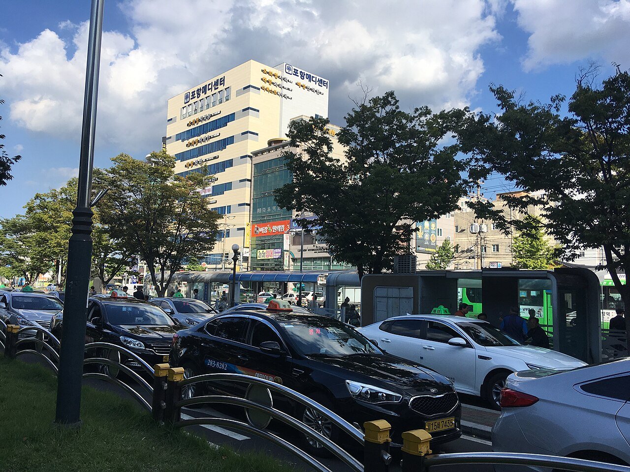 Korean taxis waiting in a line at a rank