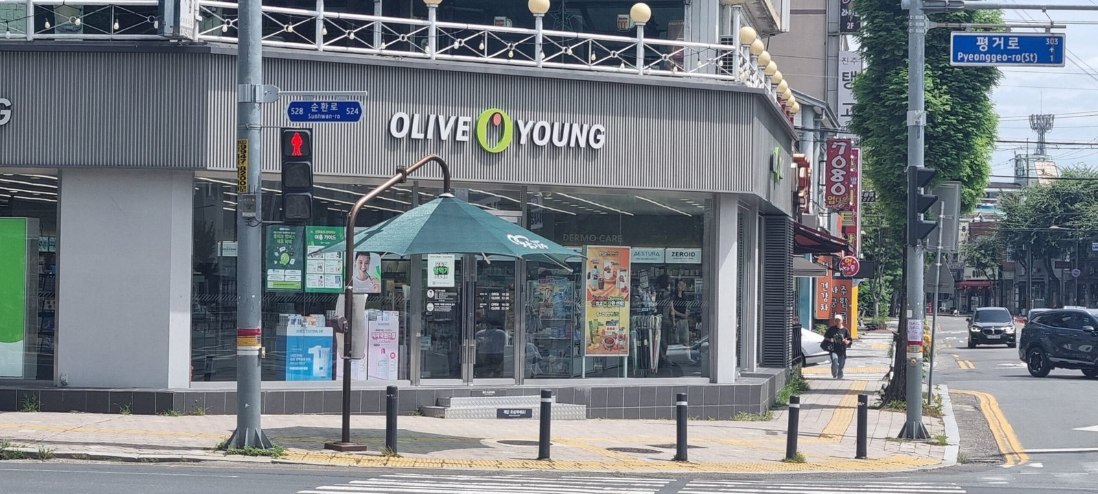 An Olive Young store on a street corner in Korea