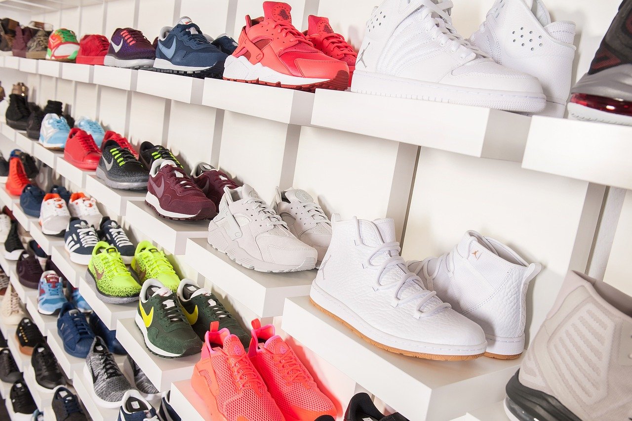 Rows of shoes on shelves in a Korean shoe shop, where sizes run out past 250mm and 280mm